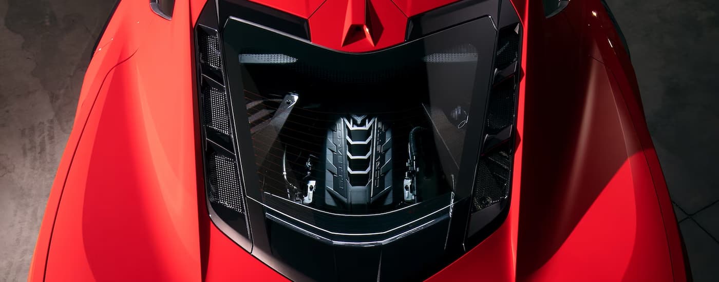 A view of the engine in a red 2024 Chevy Corvette Stingray 3LT from above.