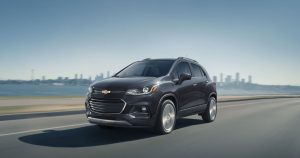 2020 Chevrolet Trax in black driving down a road