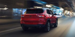 a red 2021 Chevrolet Trailblazer driving