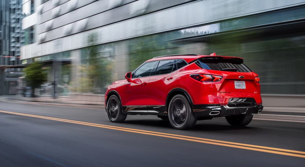 A red 2025 Chevy Blazer RS is shown from the rear at an angle after leaving a Chevy dealer near New Orleans.